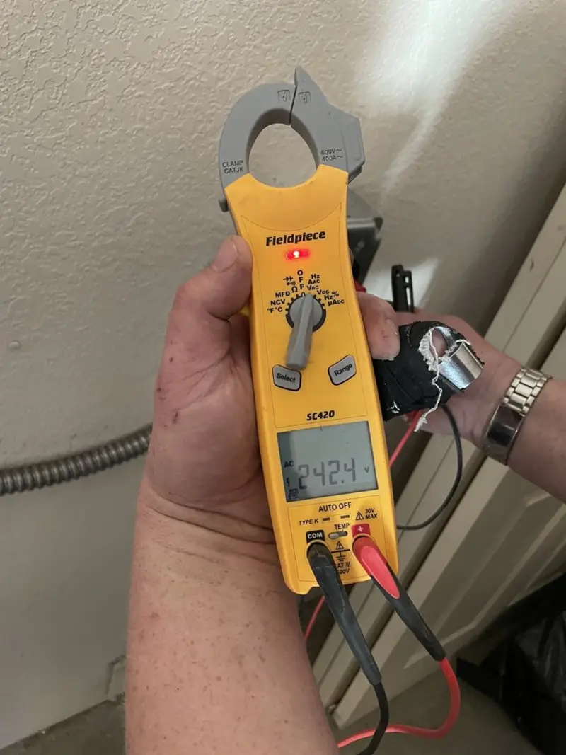 Voltage testing with clamp meter during Ceiling Fan Installation in Cockrell Hill